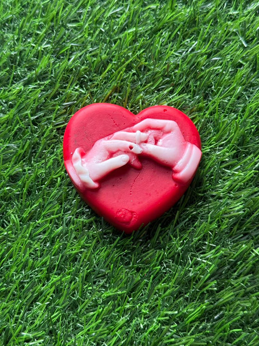 Vanyara Holding Hands Heart Candle